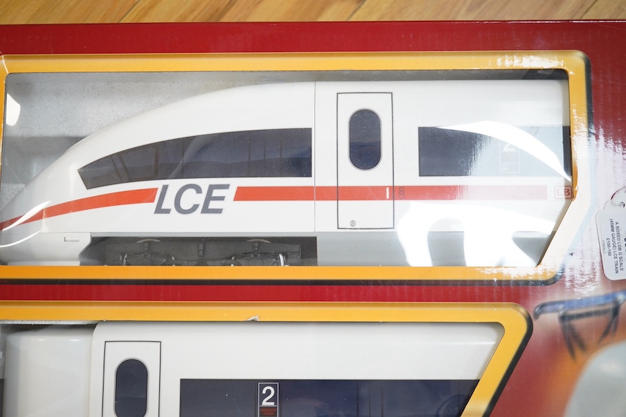 A boxed LGB G scale (45mm gauge) LCE train set (78600) together with an additional restaurant car (30604). Condition - good.